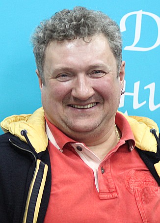 Олег Комаров